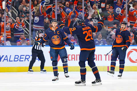 Dec 14, 2023; Edmonton, Alberta, CAN; The Edmonton Oilers celebrate a goal scored by forward Connor McDavid (97) during the second period against the Tampa Bay Lightning at Rogers Place. Mandatory Credit: Perry Nelson-USA TODAY Sports