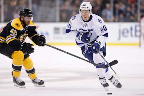 Apr 4, 2017; Boston, MA, USA; Tampa Bay Lightning center Vladislav Namestnikov (90) controls the puck while defended by Boston Bruins center David Krejci (46) during the second period at TD Garden. Mandatory Credit: Greg M. Cooper-USA TODAY Sports