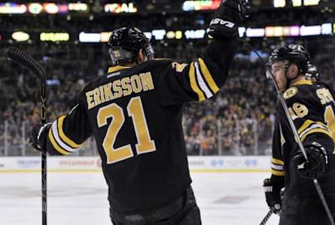 Mar 28, 2015; Boston, MA, USA; Boston Bruins left wing Loui Eriksson (21) celebrates a goal with right wing Reilly Smith (18) during the second period against the New York Rangers at TD Banknorth Garden. Mandatory Credit: Bob DeChiara-USA TODAY Sports