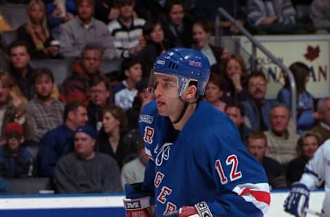 TORONTO, ON – JANUARY 8: Alexandre Daigle #12 of the New York Rangers skates against the Toronto Maple Leafs during NHL game action on January 8, 2000 at Air Canada Centre in Toronto, Ontario, Canada. (Photo by Graig Abel/Getty Images)