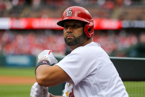 ST. LOUIS, MO – APRIL 07: Albert Pujols #5 of the St. Louis Cardinals watches from the dugout steps during the first inning against the Pittsburgh Pirates on Opening Day at Busch Stadium on April 7, 2022 in St. Louis, Missouri. (Photo by Scott Kane/Getty Images)