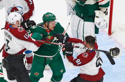 EDMONTON, ALBERTA – JULY 29: Valeri Nichushkin #13 and Nazem Kadri #91 of the Colorado Avalanche go up against Marcus Foligno #17 of the Minnesota Wild during the second period in an exhibition game prior to the 2020 NHL Stanley Cup Playoffs at Rogers Place on July 29, 2020 in Edmonton, Alberta, Canada. (Photo by Jeff Vinnick/Getty Images)