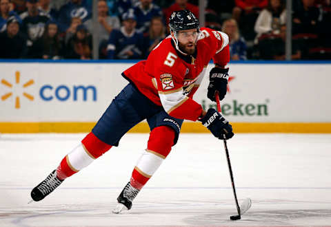 SUNRISE, FL – DECEMBER 1: Aaron Ekblad #5 of the Florida Panthers skates with the puck against the Tampa Bay Lightning at the BB&T Center on December 1, 2018 in Sunrise, Florida. (Photo by Eliot J. Schechter/NHLI via Getty Images)