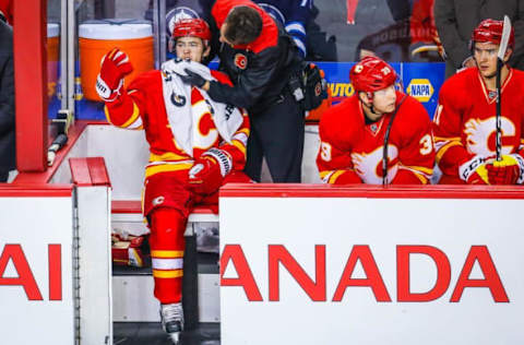 Dec 10, 2016; Calgary, Alberta, CAN; Calgary Flames left wing Johnny Gaudreau (13) on his bench against the Winnipeg Jets during the first period at Scotiabank Saddledome. Mandatory Credit: Sergei Belski-USA TODAY Sports