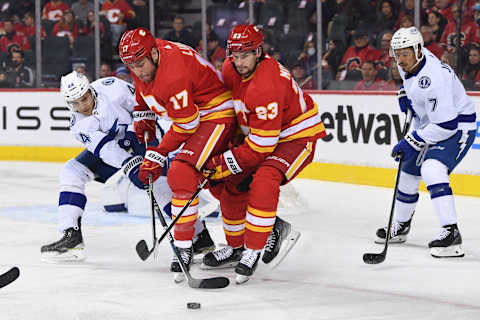 Mar 10, 2022; Calgary, Alberta, CAN; Milan Lucic (17) and forward Sean Monahan. Mandatory Credit: Candice Ward-USA TODAY Sports