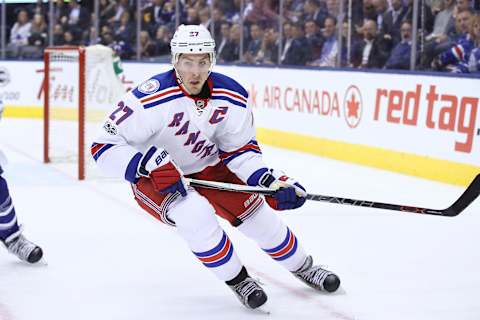 Feb 23, 2017; Toronto, Ontario, CAN; New York Rangers defenseman Ryan McDonagh (27) in action against the Toronto Maple Leafs at Air Canada Centre. The Rangers beat the Maple Leafs 2-1 in the shootout. Mandatory Credit: Tom Szczerbowski-USA TODAY Sports