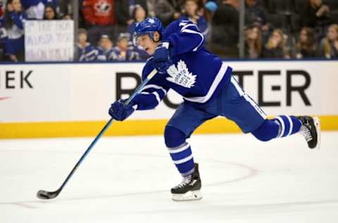 Mar 7, 2017; Toronto, Ontario, CAN; Toronto Maple Leafs forward Mitch Marner (16) takes a shot during warm ups prior to playing Detroit Red Wings at Air Canada Centre. Mandatory Credit: Dan Hamilton-USA TODAY Sports