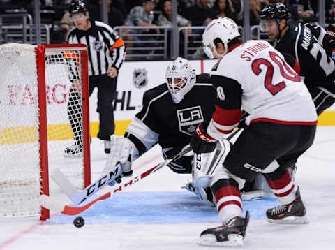 Sep 22, 2015; Los Angeles, CA, USA; Arizona Coyotes center Dylan Strome (20) scores a goal past Los Angeles Kings goalie Jhonas Enroth (1) in the first period at Staples Center. Mandatory Credit: Jayne Kamin-Oncea-USA TODAY Sports