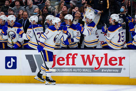 Feb 20, 2022; Columbus, Ohio, USA; Buffalo Sabres defenseman Mark Pysyk (13) celebrates with teammates after scoring a goal against the Columbus Blue Jackets in the first period at Nationwide Arena. Mandatory Credit: Aaron Doster-USA TODAY Sports