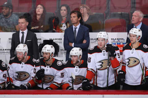 GLENDALE, ARIZONA – OCTOBER 02: Head coach Dallas Eakinsof the Anaheim Ducks watches from the bench during the third period of the NHL game against the Arizona Coyotes at Gila River Arena on October 02, 2021 in Glendale, Arizona. The Coyotes defeated the Ducks 4-3.ˆ (Photo by Christian Petersen/Getty Images)