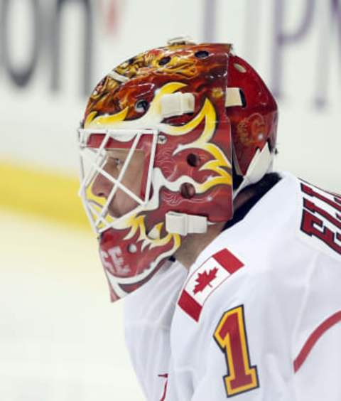 Feb 7, 2017; Pittsburgh, PA, USA; Calgary Flames goalie Brian Elliott (1) looks on during warm-ups against the Pittsburgh Penguins at the PPG PAINTS Arena. The Flames won 3-2 in a shootout. Mandatory Credit: Charles LeClaire-USA TODAY Sports