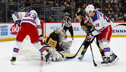 PITTSBURGH, PENNSYLVANIA – NOVEMBER 22: Tristan Jarry #35 of the Pittsburgh Penguins makes a save on a shot by Mika Zibanejad #93 of the New York Rangers in the second period during the game at PPG PAINTS Arena on November 22, 2023 in Pittsburgh, Pennsylvania. (Photo by Justin Berl/Getty Images)