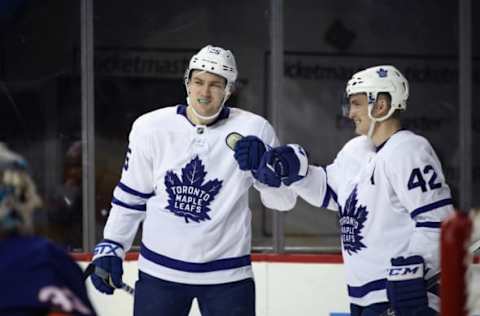 NEW YORK, NY – MARCH 30: James van Riemsdyk #25 (l) of the Toronto Maple Leafs scores at 2:01 of the third period against the New York Islanders and is joined by Tyler Bozak #42 (r) at the Barclays Center on March 30, 2018 in the Brooklyn borough of New York City. (Photo by Bruce Bennett/Getty Images)