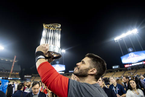 LOS ANGELES, CA – OCTOBER 28: J.D. Martinez #28 of the Boston Red Sox holds the World Series after winning the 2018 World Series in game five against the Los Angeles Dodgers on October 28, 2018 at Dodger Stadium in Los Angeles, California. (Photo by Billie Weiss/Boston Red Sox/Getty Images)