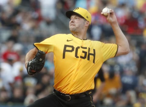 Jul 14, 2023; Pittsburgh, Pennsylvania, USA; Pittsburgh Pirates starting pitcher Rich Hill (44) delivers a pitch against the San Francisco Giants during the first inning at PNC Park. Mandatory Credit: Charles LeClaire-USA TODAY Sports