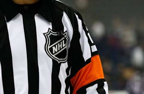 Sep 21, 2015; Columbus, OH, USA; A general view of the NHL shield on a referee