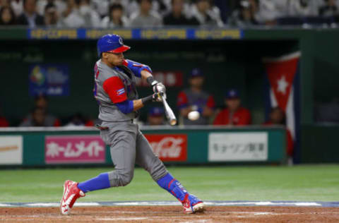 TOKYO, JAPAN – MARCH 14: Victor Victor Mesa #32 of Team Cuba hits a two-run RBI single in the fourth inning during Game 4 of Pool E of the 2017 World Baseball Classic against Team Japan at the Tokyo Dome on Monday, March 14, 2017 in Tokyo, Japan. (Photo by Yuki Taguchi/WBCI/MLB Photos via Getty Images)