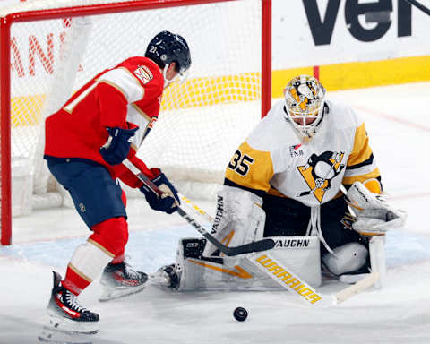 SUNRISE, FL – DECEMBER 8: Goaltender Tristan Jarry #35 of the Pittsburgh Penguins stops a shot by Nick Cousins #21 of the Florida Panthers during third period action at the Amerant Bank Arena on December 8, 2023 in Sunrise, Florida. (Photo by Joel Auerbach/Getty Images)