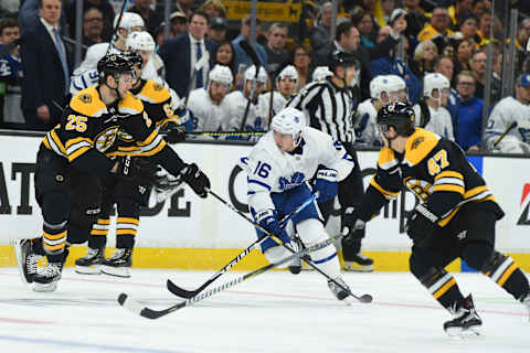 BOSTON, MA – APRIL 19: Mitchell Marner #16 of the Toronto Maple Leafs skates against Brandon Carlo #25 and Torey Krug #47 of the Boston Bruins in Game Five of the Eastern Conference First Round during the 2019 NHL Stanley Cup Playoffs at the TD Garden on April 19, 2019 in Boston, Massachusetts. (Photo by Steve Babineau/NHLI via Getty Images)