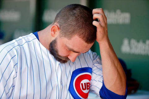 CHICAGO, IL – JULY 07: Tyler Chatwwood #21 of the Chicago Cubs scratches his head while he walks in the dugout after the first inning of their game against the Cincinnati Reds at Wrigley Field on July 7, 2018 in Chicago, Illinois. (Photo by Jon Durr/Getty Images)