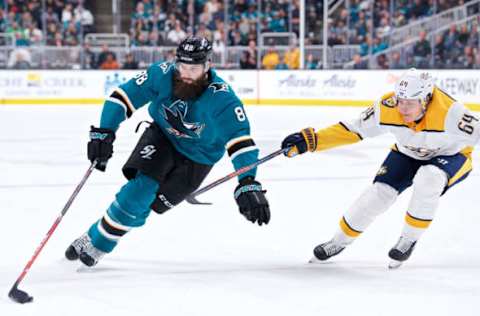 SAN JOSE, CA – MARCH 16: San Jose Sharks defenseman Brent Burns (88) holds off Nashville Predators center Mathieu Olivier (64) during the San Jose Sharks game versus the Nashville Predators on March 16, 2019, at SAP Center at San Jose in San Jose, CA. (Photo by Matt Cohen/Icon Sportswire via Getty Images)