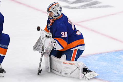 Apr 23, 2023; Elmont, New York, USA; New York Islanders goaltender Ilya Sorokin (30) makes a save against the Carolina Hurricanes during the third period in game four of the first round of the 2023 Stanley Cup Playoffs at UBS Arena. Mandatory Credit: Dennis Schneidler-USA TODAY Sports