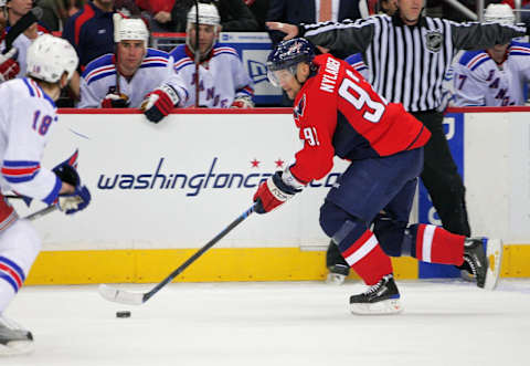 WASHINGTON – APRIL 15: Michael Nylander #92 of the Washington Capitals skates the puck along the boards against the New York Rangers during Game One of the Eastern Conference Quarterfinals Round of the 2009 Stanley Cup Playoffs on April 15, 2009 at the Verizon Center in Washington, DC. (Photo by Len Redkoles/Getty Images)