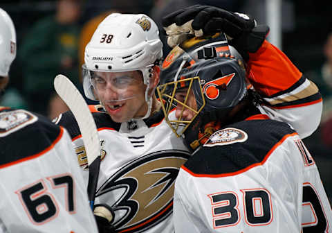 ST. PAUL, MN – FEBRUARY 19: Derek Grant #38 of the Anaheim Ducks congratulates Ryan Miller #30 of the Anaheim Ducks on his shutout victory over the Minnesota Wild after a game at Xcel Energy Center on February 19, 2019, in St. Paul, Minnesota. (Photo by Bruce Kluckhohn/NHLI via Getty Images)