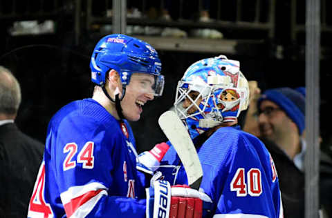 NEW YORK, NEW YORK – NOVEMBER 12: Alexandar Georgiev #40 and Kaapo Kakko #24 of the New York Rangers celebrate after Kakko scored the game winning goal in overtime for a score of 3-2 over the Pittsburgh Penguins at Madison Square Garden on November 12, 2019 in New York City. (Photo by Emilee Chinn/Getty Images)