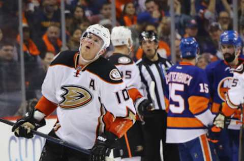 NEW YORK, NY: Corey Perry #10 of the Anaheim Ducks reacts after being hit with a shot during the second period against the New York Islanders at the Barclays Center on October 16, 2016. (Photo by Bruce Bennett/Getty Images)