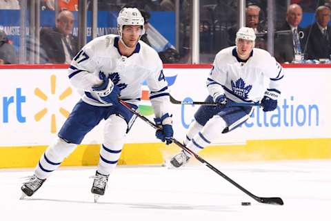 PHILADELPHIA, PA – DECEMBER 03: Pierre Engvall #47 of the Toronto Maple Leafs controls the puck as Justin Holl #3 trails on the play against the Philadelphia Flyers at the Wells Fargo Center on December 3, 2019 in Philadelphia, Pennsylvania. (Photo by Mitchell Leff/Getty Images)