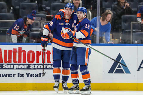 Feb 17, 2023; Elmont, New York, USA; New York Islanders center Brock Nelson (29) celebrates with center Mathew Barzal (13) after scoring a goal in the second period against the Pittsburgh Penguins at UBS Arena. Mandatory Credit: Wendell Cruz-USA TODAY Sports