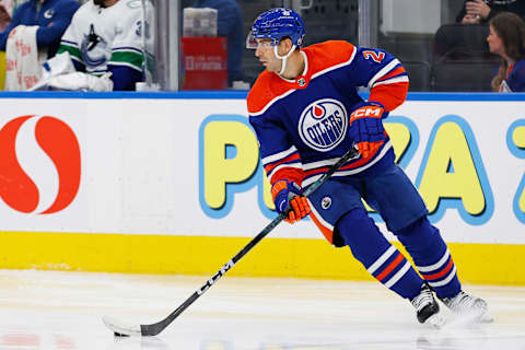 Sep 27, 2023; Edmonton, Alberta, CAN; Edmonton Oilers defensemen Evan Bouchard (2) against the Vancouver Canucks at Rogers Place. Mandatory Credit: Perry Nelson-USA TODAY Sports