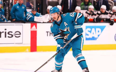 Nov 1, 2022; San Jose, California, USA; San Jose Sharks defenseman Erik Karlsson (65) controls the puck against the Anaheim Ducks during the second period at SAP Center at San Jose. Mandatory Credit: Kelley L Cox-USA TODAY Sports