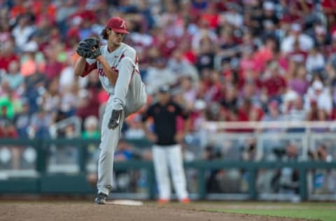 OMAHA, NE – JUNE 26: Arkansas’s Blaine Knight (16) pitching against Oregon State during the first game of the finals in the College World Series in Omaha, Nebraska. Arkansas beats Oregon State 4 to 1. (Photo by John Peterson/Icon Sportswire via Getty Images)