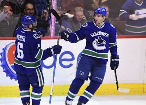 Mar 9, 2016; Vancouver, British Columbia, CAN; Vancouver Canucks forward Radim Vrbata (17) celebrates with defenseman Yannick Weber (6) after scoring a goal against Arizona Coyotes goaltender Louis Domingue (not pictured) during the second period at Rogers Arena. Mandatory Credit: Anne-Marie Sorvin-USA TODAY Sports