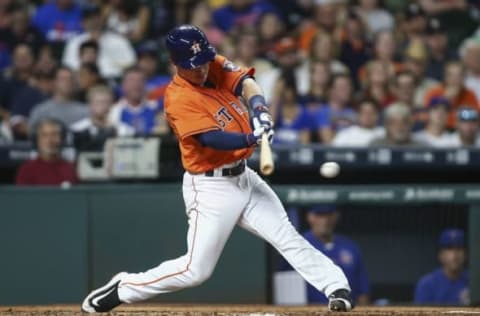 Sep 9, 2016; Houston, TX, USA; Houston Astros shortstop Alex Bregman (2) hits a single during the fourth inning against the Chicago Cubs at Minute Maid Park. Mandatory Credit: Troy Taormina-USA TODAY Sports