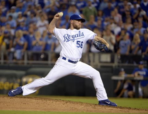 Sep 8, 2015; Kansas City, MO, USA; Kansas City Royals relief pitcher Greg Holland (56) delivers a pitch against the Minnesota Twins in the ninth inning at Kauffman Stadium. Kansas City won the game 4-2. Mandatory Credit: John Rieger-USA TODAY Sports