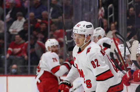 DETROIT, MICHIGAN – MARCH 01: Jesperi Kotkaniemi #82 of the Carolina Hurricanes skates against the Detroit Red Wings at Little Caesars Arena on March 01, 2022, in Detroit, Michigan. (Photo by Gregory Shamus/Getty Images)