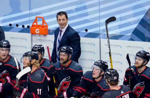 Aug 15, 2020; Toronto, Ontario, CAN; Carolina Hurricanes head coach Rod Brind’Amour talks with his team during the first period in game three of the first round of the 2020 Stanley Cup Playoffs at Scotiabank Arena. Mandatory Credit: John E. Sokolowski-USA TODAY Sports