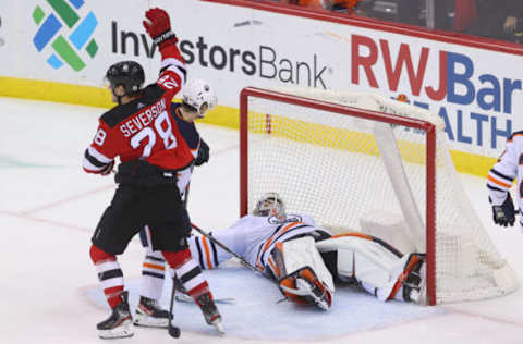 New Jersey Devils score a goal on Edmonton Oilers goaltender Mike Smith (41) Mandatory Credit: Ed Mulholland-USA TODAY Sports