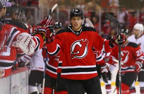 Oct 25, 2016; Newark, NJ, USA; New Jersey Devils left wing Taylor Hall (9) celebrates his goal against the Arizona Coyotes during the first period at Prudential Center. Mandatory Credit: Ed Mulholland-USA TODAY Sports