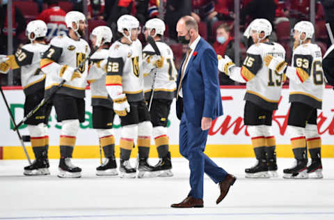 MONTREAL, QC - NOVEMBER 06: Head coach of the Vegas Golden Knights Peter DeBoer walks across the ice as his team celebrates a victory against the Montreal Canadiens at Centre Bell on November 6, 2021 in Montreal, Canada. The Vegas Golden Knights defeated the Montreal Canadiens 5-2. (Photo by Minas Panagiotakis/Getty Images)