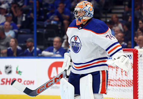 Nov 18, 2023; Tampa, Florida, USA; Edmonton Oilers goaltender Stuart Skinner (74) looks on against the Tampa Bay Lightning during the third period at Amalie Arena. Mandatory Credit: Kim Klement Neitzel-USA TODAY Sports