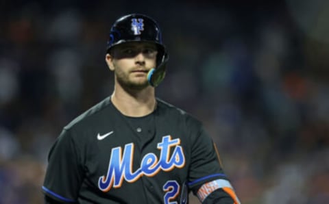 Pete Alonso walks back to the dugout after striking out in the first inning. Brad Penner-USA TODAY Sports