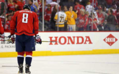 Washington Capitals left wing Alex Ovechkin (8) stands on the ice after the Capitals 2-0 loss (Geoff Burke-USA TODAY Sports)