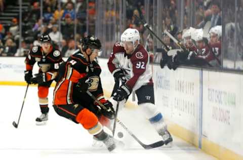 ANAHEIM, CALIFORNIA – MARCH 03: Cam Fowler #4 of the Anaheim Ducks and Gabriel Landeskog #92 of the Colorado Avalanche fight for control of the puck during the third period at Honda Center on March 03, 2019 in Anaheim, California. (Photo by Katharine Lotze/Getty Images)