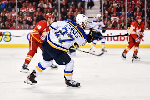 CALGARY, AB – NOVEMBER 09: St. Louis Blues Defenceman Alex Pietrangelo (27) takes a shot on net during the second period of an NHL game where the Calgary Flames hosted the St. Louis Blues on November 9, 2019, at the Scotiabank Saddledome in Calgary, AB. (Photo by Brett Holmes/Icon Sportswire via Getty Images)