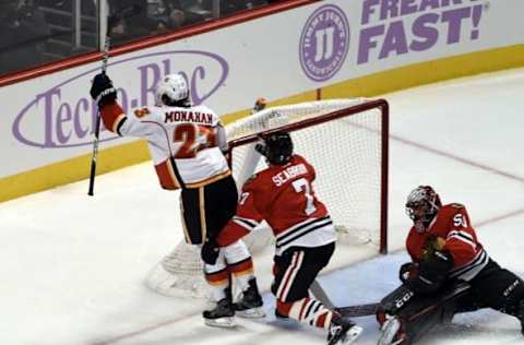 Oct 24, 2016; Chicago, IL, USA; Calgary Flames center Sean Monahan (23) reacts after scoring a goal on Chicago Blackhawks goalie Corey Crawford (50) during the second period at the United Center. Mandatory Credit: David Banks-USA TODAY Sports