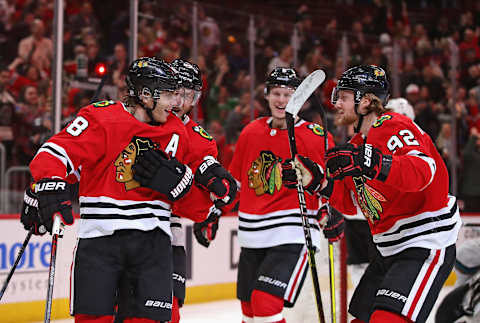 Patrick Kane #88 of the Chicago Blackhawks (L) celebrates his second goal of the game (Photo by Jonathan Daniel/Getty Images)